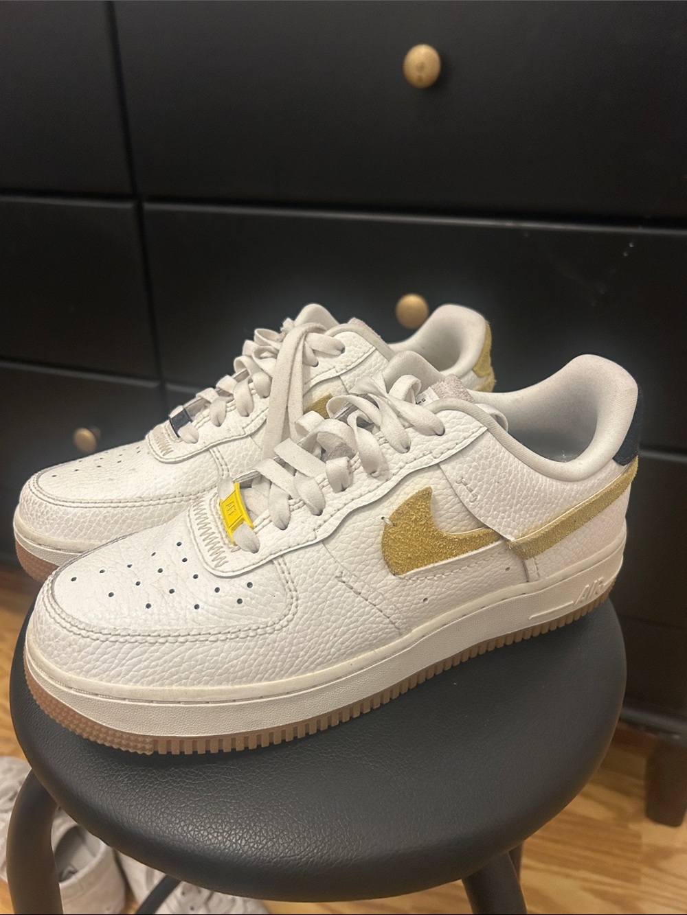 Women’s White Leather Sneakers with Gold Swoosh